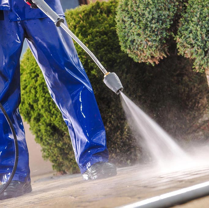 High pressure cleaning of driveway and paths