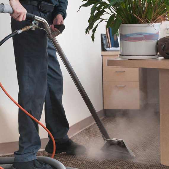 Carpet Steam Cleaning in Melbourne - steam cleaning of carpet with machine