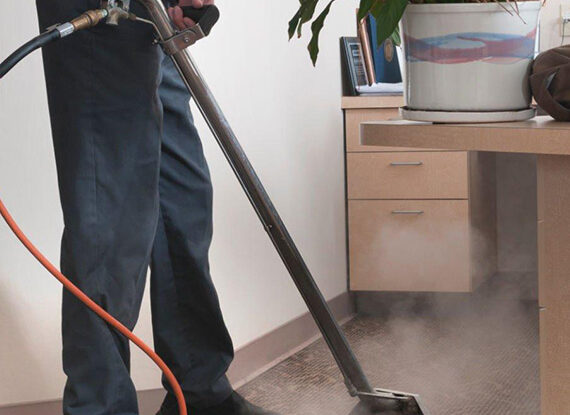 steam-cleaning-of-carpet-with-machine
